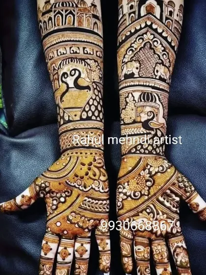 This design is a beautiful example of Marwadi style, with fine lines and detailed figures covering the entire arm.