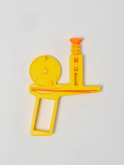 Another angle of the disc launcher, showing the magazine loaded with discs.