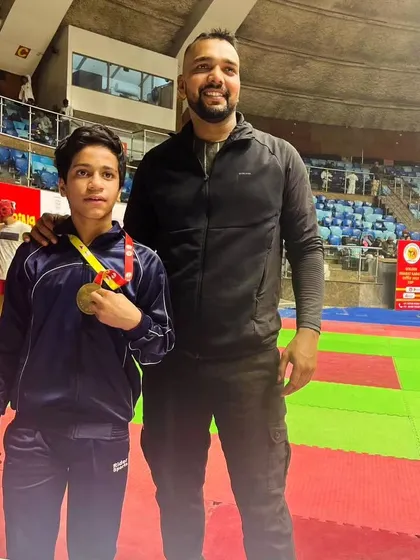 With another young champion. It's a privilege to guide these young athletes on their path to success.