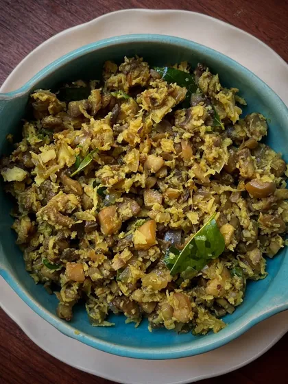 Our Mushroom Thoran is a sleeper hit. It's earthy, effortless, and unforgettable. It may sit shy on the menu, but one bite of this mushroom and coconut stir-fry and it steals the scene.