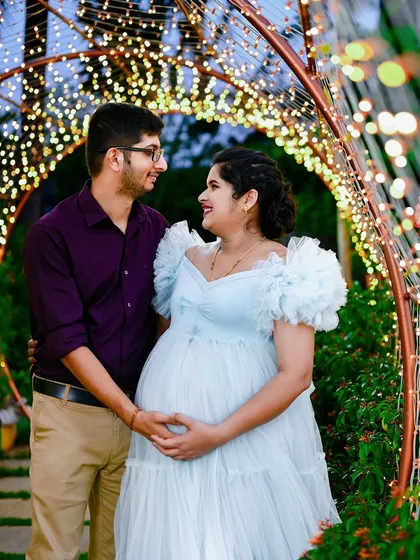 Maternity shoots are close to my heart. Here, we used a tunnel of fairy lights to create a magical atmosphere, celebrating the beautiful journey to parenthood.