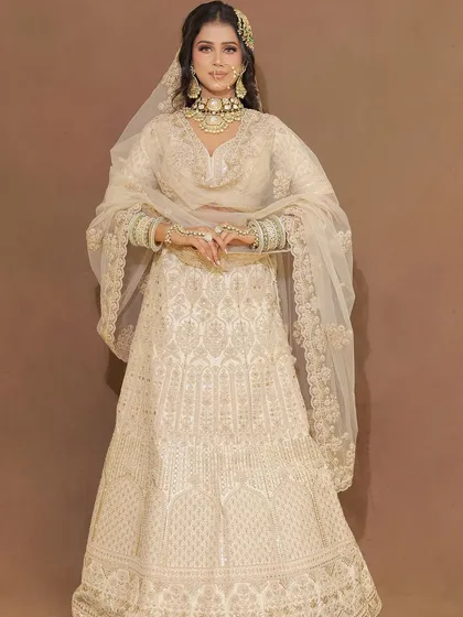 Three stunning shots of our pearl white chikankari lehenga. This is a perfect option for creators working on Nikah, day wedding, or minimalist luxury themes.