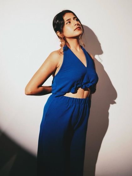 A standing portrait from a photoshoot.