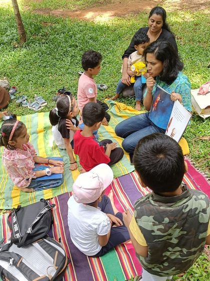 A series of photos from our 'Hope and Contentment' session with the book 'How to Catch a Star'. The natural light and engaged audience make for beautiful shots.