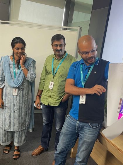 Participants presenting their group work during an image management session. This part of the workshop allows teams to apply their new knowledge and receive constructive feedback in a supportive setting.