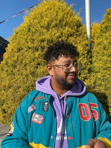 A colorful look. I'm not afraid to switch up my style, just like I switch up my flows. Versatility is key.