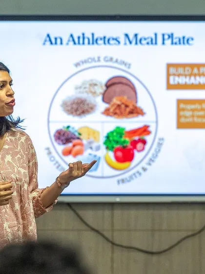 This is a core part of my teaching: how to build a performance-enhancing meal plate. In my workshops, I break down the roles of whole grains, lean protein, and fresh produce to give athletes a practical edge through proper nutrition.