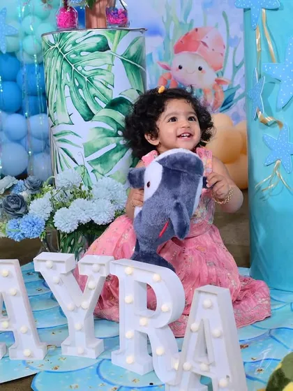 Here is the birthday girl, adorable Ayra, enjoying her special 'One-der the Sea' party. Seeing the joy on a child's face is the best part of my job.