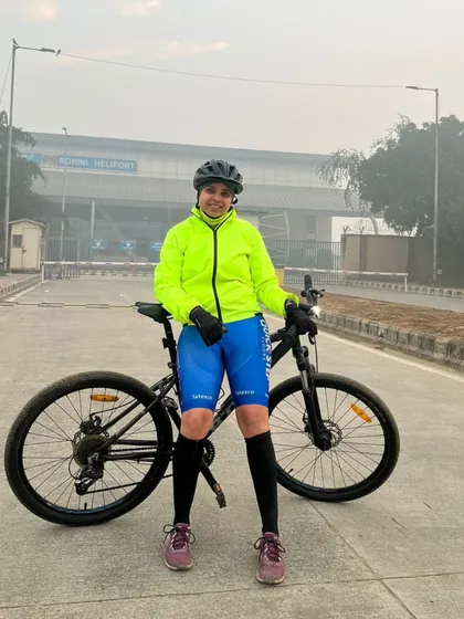 A member posing at the Rohini Heliport. Our rides take us to unique and interesting locations.