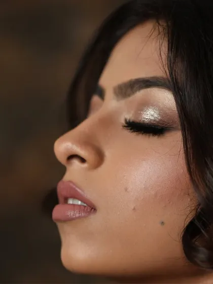 A profile close-up of the second look from our masterclass. This angle is perfect for showing off the seamless blend of the eyeshadow and the natural-looking skin texture.