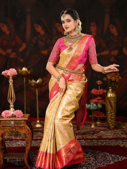 A confident and classic bridal portrait. The makeup is bold yet elegant, perfect for a bride who wants to make a statement.