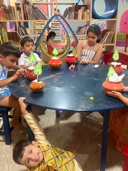 Children making 'dahi handi' crafts for our Janmashtami celebration. This activity is a fun, hands-on way to learn about the festival.