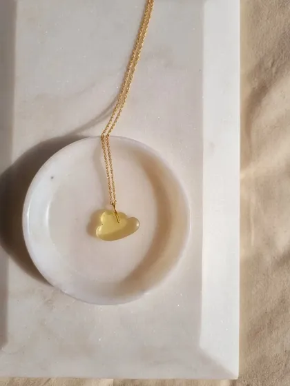 A closer look at the 'megh' lemon quartz cloud pendant. It's a wonderful stone for anyone needing to reduce anxiety, find calm, and improve their focus.