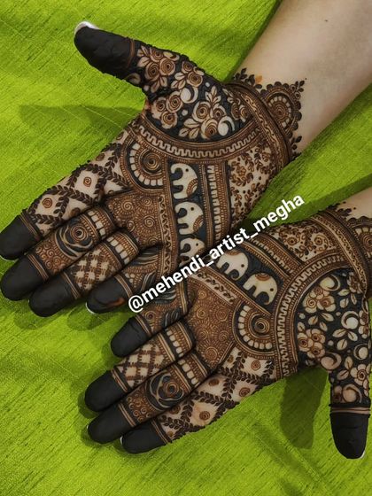 This unique design features a striking elephant procession on the wristband, contrasted with dark floral patterns for a modern yet traditional feel.