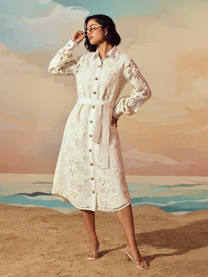 A full-length shot for Qala Clothing's "Casa Solana" collection. The painted backdrop and sand floor were part of a custom set we created to evoke a serene, seaside atmosphere for their resort wear line.