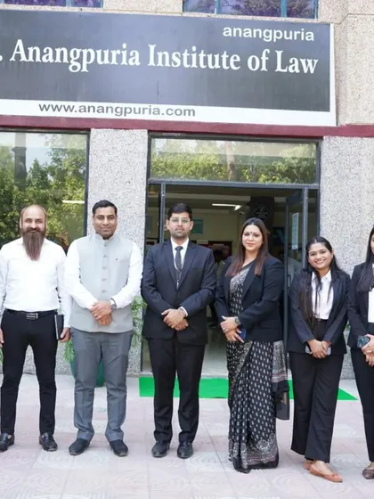 A group photo with my N Legal team and senior advocates outside the B.S. Anangpuria Institute of Law. We are united in our mission to serve the community through legal education.