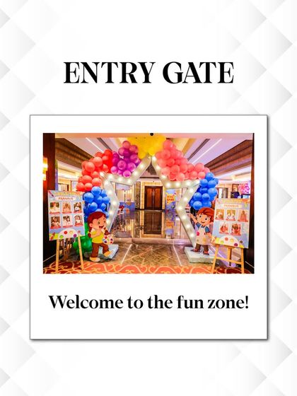 A star is born! This star-shaped entry gate, framed by a colorful balloon arch and personalized welcome easels, made for a grand entrance at this art-themed birthday party.