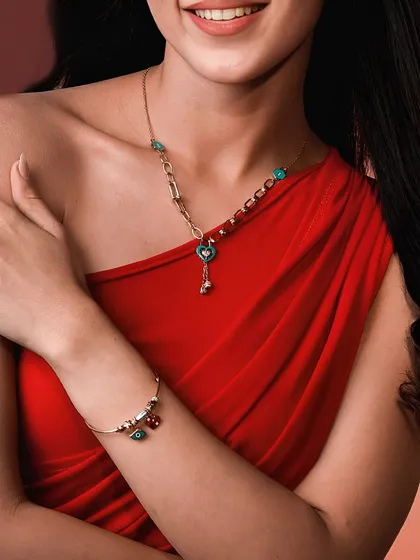 For the moments that deserve to be cherished forever. My exclusive collection for the season of love features modern designs like this charm bracelet and linked necklace.
