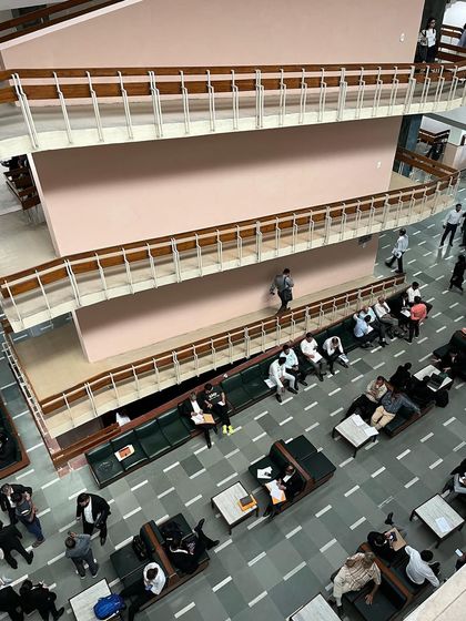 A typical scene from inside the court after vacations. The building is alive with the energy of lawyers and litigants, a true representation of the constant motion of the legal world.