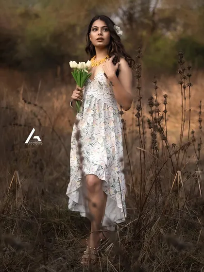 This final image from the series captures a slightly different angle and expression. The soft light and natural setting make it a great example of the kind of dreamy, atmospheric portraits I create during my outdoor sessions.