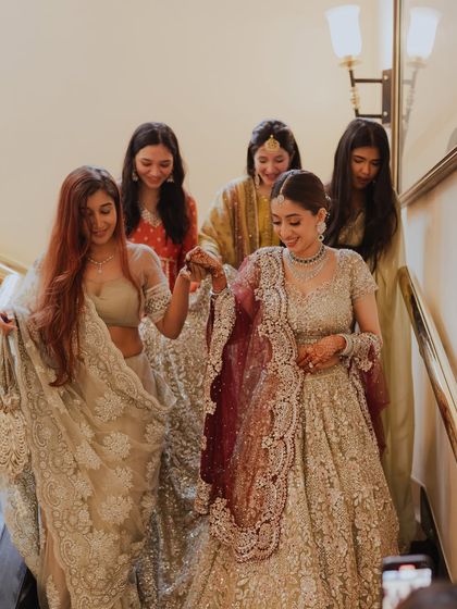 A lovely moment with the bride and her bridesmaids, all looking beautiful and ready for the ceremony.