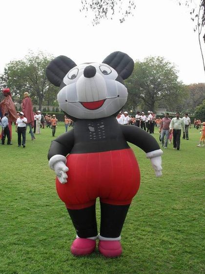 Our giant inflatable Mickey Mouse character is perfect for outdoor events and makes a huge impression. It's a fantastic photo opportunity for all the guests.