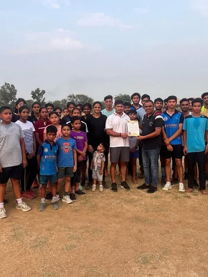 The entire academy with the invitation for the award ceremony. We celebrate these moments of recognition together as a team.