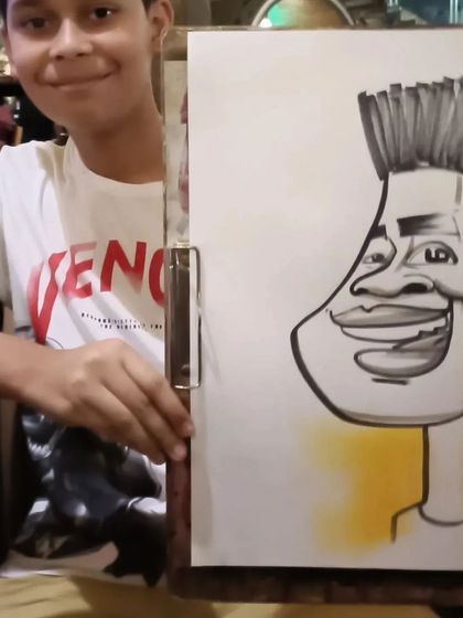 A young boy with a cool hairstyle, captured in his caricature.