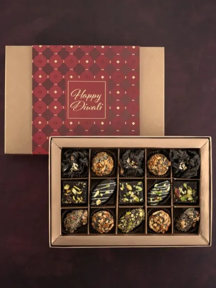 Our assorted Diwali gift box features a mix of our special eggless and no added sugar chocolates, including Kunafa Crunch, Nutty Rochers, and Dry Fruit Dates.