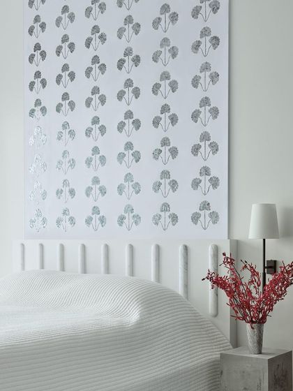 A full view of the finished Thikri panel, showcasing the beautiful repetitive floral motif before its installation in the Peninsula Residence.