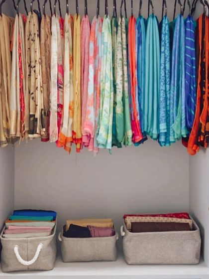 We used felt baskets to organize petticoats and other saree essentials below a collection of beautifully hung sarees, keeping everything related in one convenient place.