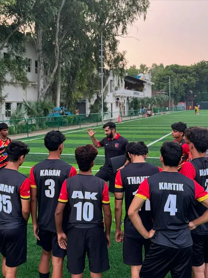 A crucial part of my coaching is the pre-game tactical talk. Here, I'm outlining our strategy, ensuring every player understands their role and is mentally prepared for the match ahead.