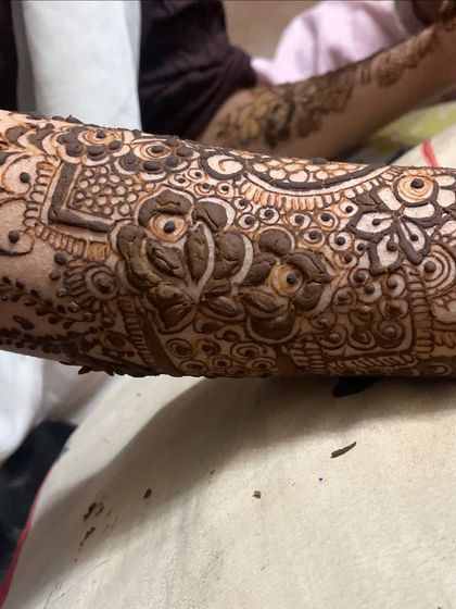 The intricate detail work on the arm for a bridal client. Every single space is filled with art.