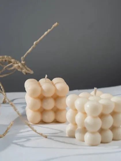 Two classic bubble candles, unlit, showcasing their perfect form. A must-have for any lover of minimalist and aesthetic decor.