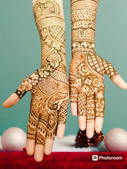 A festive design with a mix of peacock and floral motifs, perfect for a bride or for any grand celebration.