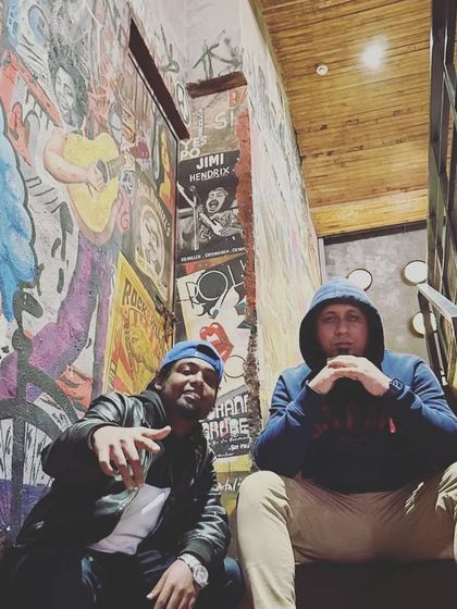 Me and the homie, posted up. The hustle is always better when you have a solid crew around you.