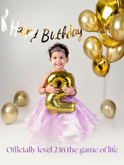 Officially level two in the game of life. A second birthday is double the fun, and I make sure to capture that energy with props and setups that match your little one's personality.