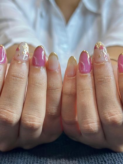 This abstract design combines a shimmery pink base with delicate, hand-painted gold foil accents for a modern and artistic look.