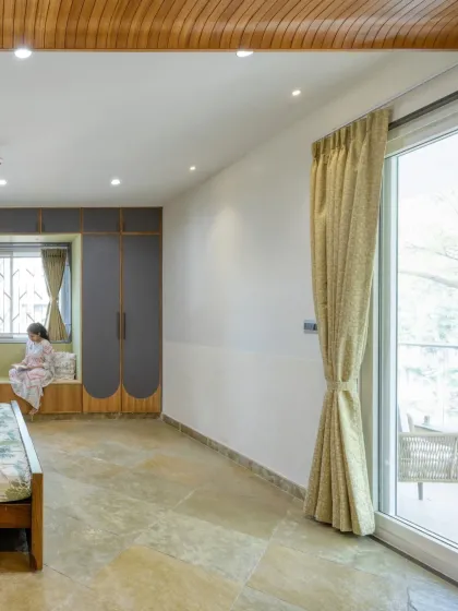 The master bedroom at Villa 17 includes a cozy bay window seat with built-in storage, creating a perfect nook for reading and enjoying the natural light.