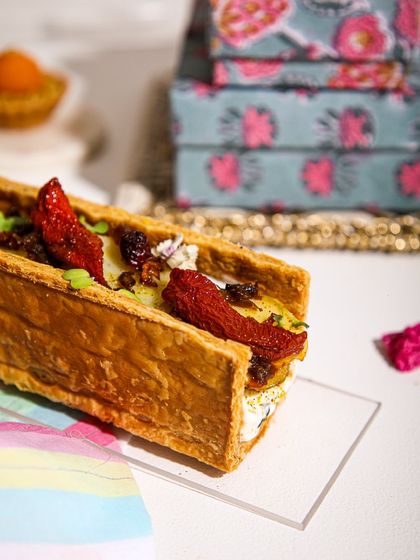 A savoury surprise! Our flaky puff tarts with bold, gourmet fillings like sun-dried tomato and feta are here to balance the sweetness.