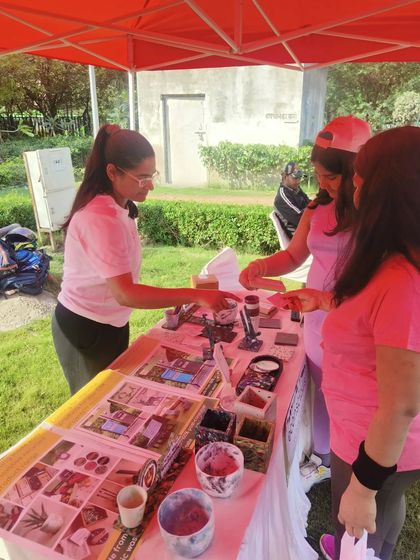 Our co-founder Sonal explaining our products to visitors at an outdoor event. We believe that education and awareness are key to driving change.