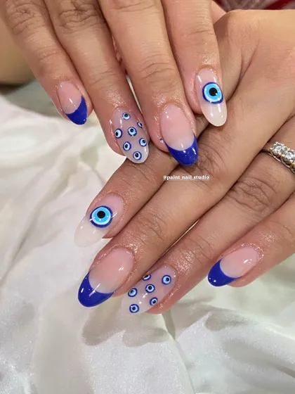 The final evil eye set, perfectly executed. The lines are crisp, the colors are vibrant, and the design is perfectly placed. This is a client favorite for a reason.