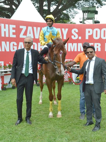 Promiseofthefuture, with jockey Pavan, after winning The Hyderabad Salver during the Bangalore Summer Meeting.
