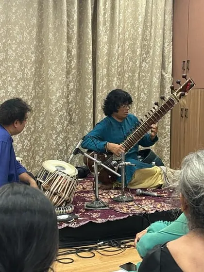 An intimate baithak (house concert) setting for the inauguration of Nad-roop Bhate Sangeet Avakash, performing for Padmashree Suresh Talwalkar and other music connoisseurs.