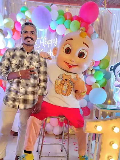 Here I am with our JJ mascot. As a business owner, I personally oversee the events to ensure the quality is top-notch and every client is happy. Shevati vishay qualitycha ahe.