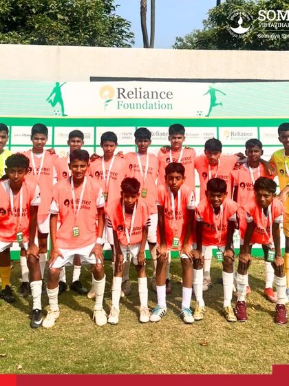 Our Somaiya FC U-15 team in their orange kits after a dominant 7-1 win in the Reliance Foundation Youth Sports Tournament.