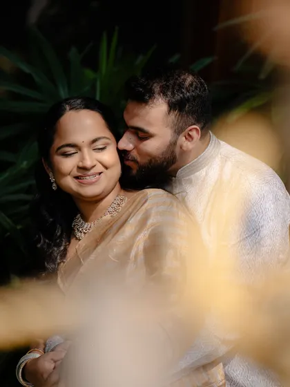 An artistic and romantic shot of the couple. The 'no-makeup' makeup look is perfect for these intimate, candid moments.