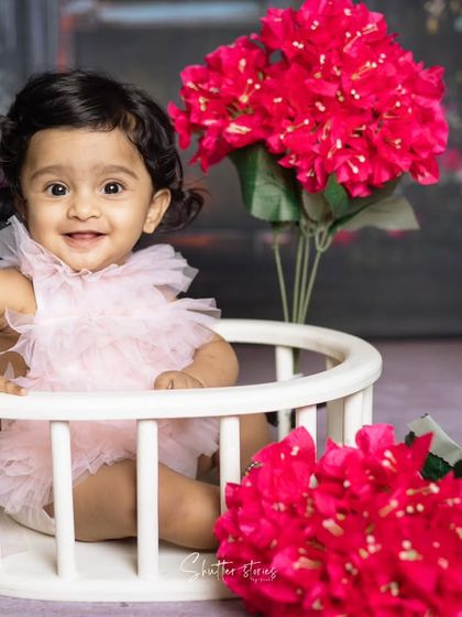 Another joyful shot from the pink floral milestone session.