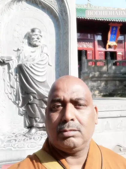 A photo of me at the Bodhidharma statue. Damo, as he is known in China, is the first patriarch of Zen and the inspiration for our practice.
