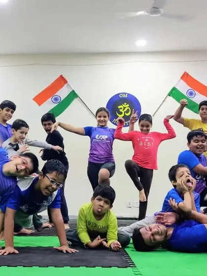 Our motto is to make training fun so everyone can enjoy the process while achieving their goals. This picture captures the chaotic, happy energy of our kids and adults training together.